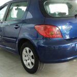 Pintamos este Peugeot 307 de 17 años y lo dejamos como un bebé